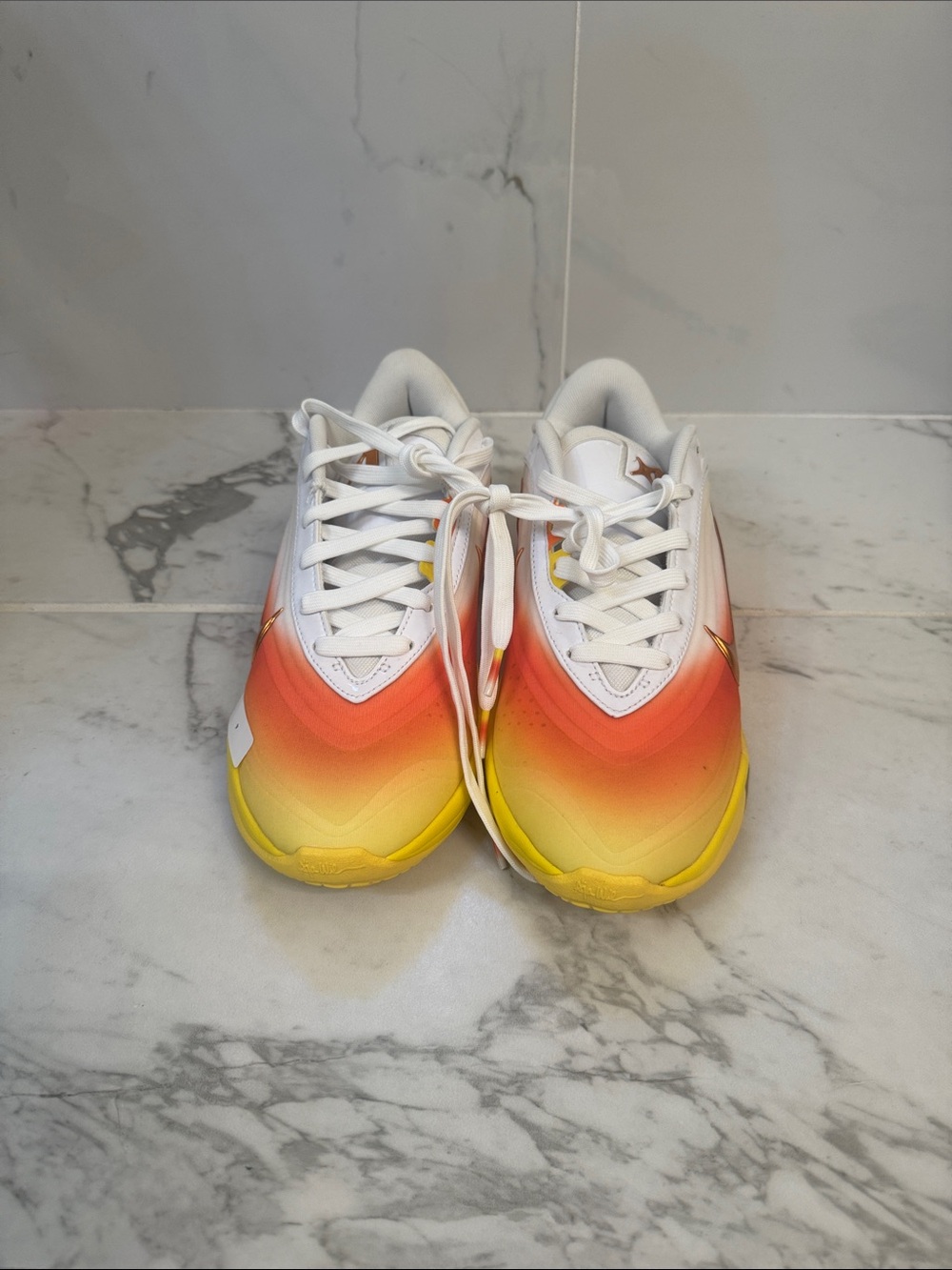 Nike White Sneakers with Orange-to-Yellow Gradient